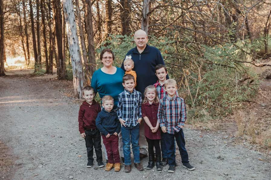 Dooley’s Water Solutions family standing together outdoors